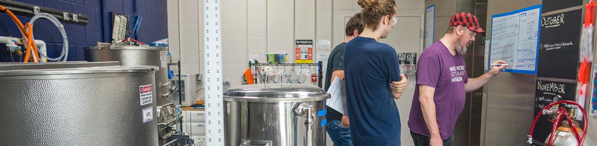 Students planning brew schedule