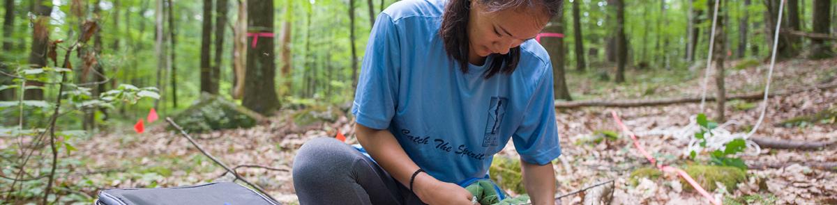 Environmental Conservation and Sustainability student doing field work