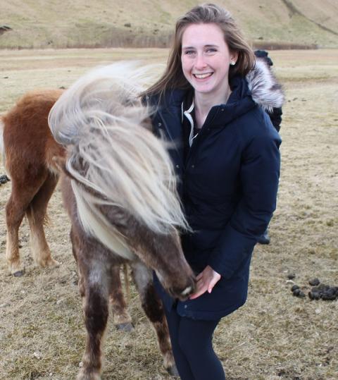 student with horse