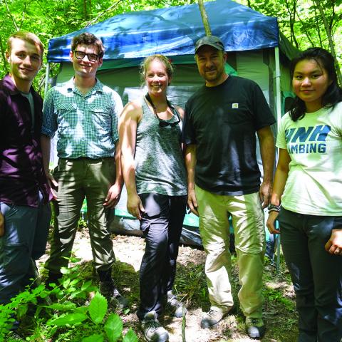 UNH Assistant Professor Jeff Garnas and his research team