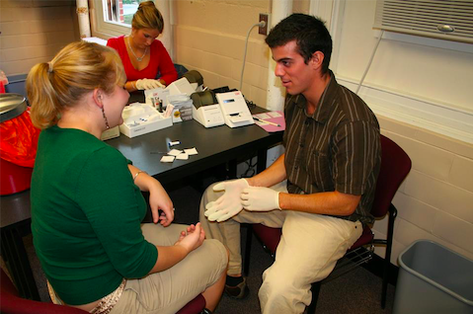 Student preparing for the finger prick lab test