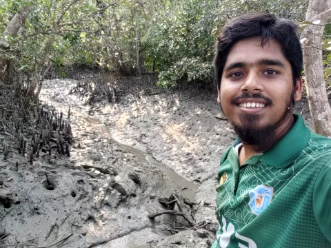UNH grad student Md Seikh Sadiul Islam Tanvir in a mangrove forest in Bangladesh