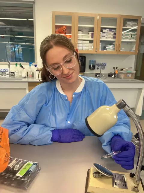 UNH medical laboratory science major Melissa Kulpeksa in the lab