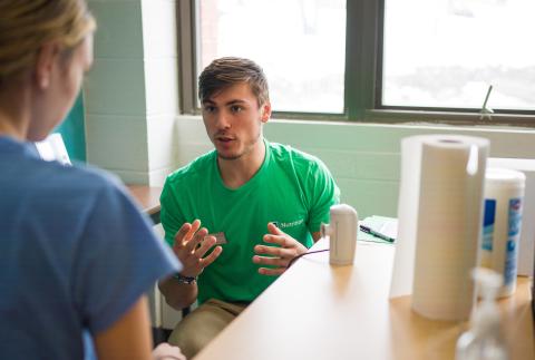 UNH nutrition major Roman Volpe practices nutrition counseling with a peer