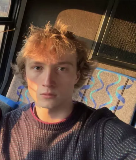 Headshot of UNH undergraduate Westley Mitchell on a UNH campus bus