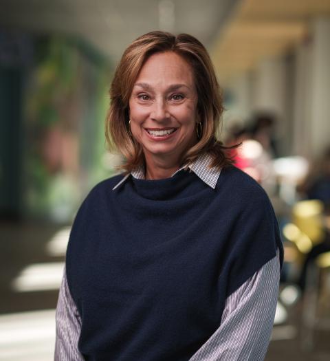 Alumna Samantha Furstein '92 poses in the Spaulding Hall addition