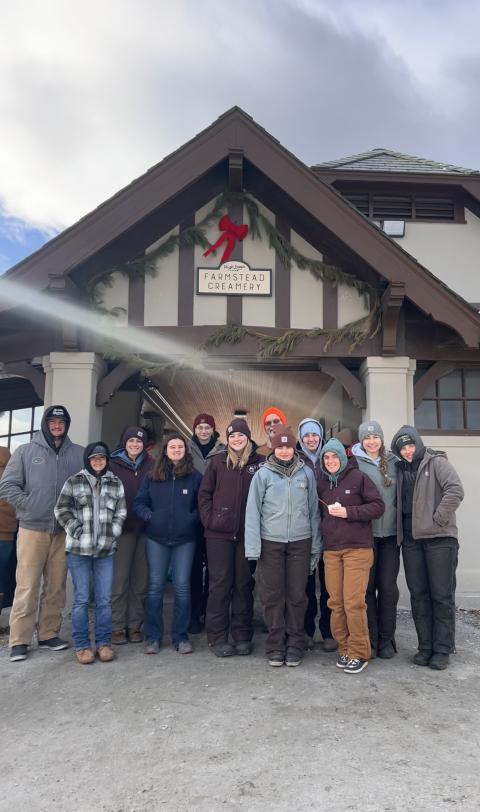 Photo of UNH students at a New England Dairy Farm