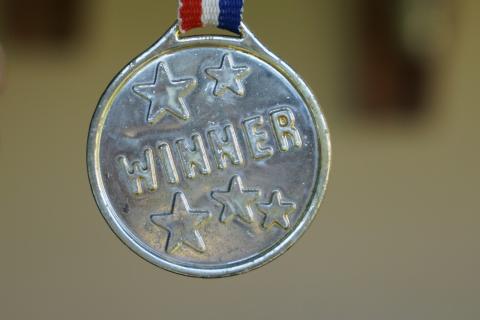 Medal that says "winner"