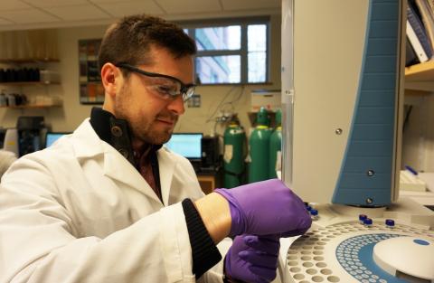 Bennett Thompson works in the lab