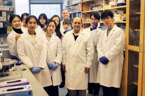 Professor Minocha poses with the eight students from South Korea