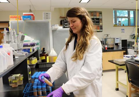 UNH Doctoral Candidate Andrea Jilling at Examines Samples