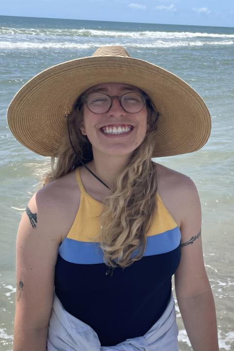 UNH postdoctoral research associate Maryrose Weatherton on the beach