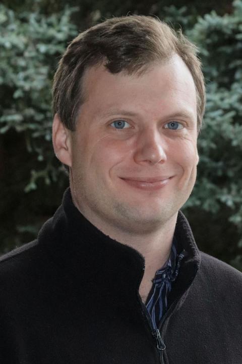 A photo of Nick Gosling, a communications specialist with COLSA/NHAES